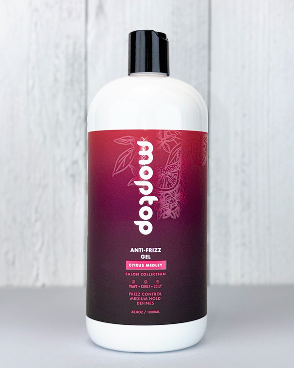 Front view of a 32 ounce bottle of Salon Anti Frizz Gel