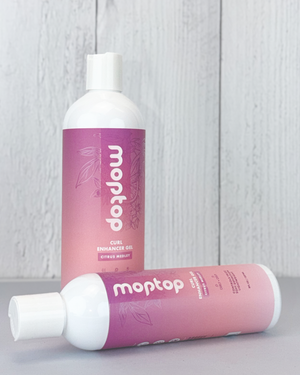 An 8 ounce and 16 ounce bottle of Curl Enhancer Gel