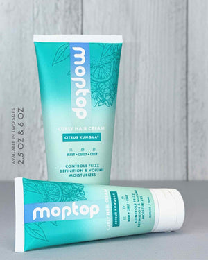 A 2.5 ounce and 6 ounce bottle of Curly Hair Cream