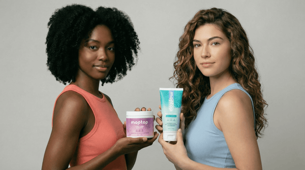 Two women holding Curly hair cream and Curly Hair Custard.